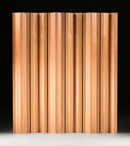 AN EAMES MOLDED WALNUT PLYWOOD