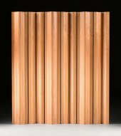 AN EAMES MOLDED WALNUT PLYWOOD