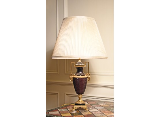 An early 20th C. lamp with a saw