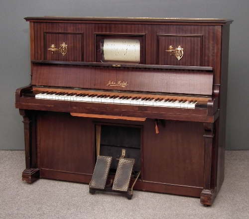 An early 20th Century upright