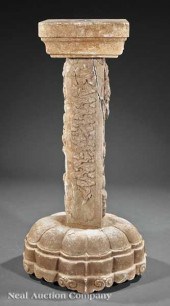 An Early Asian Carved Stone Bu