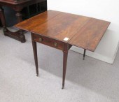 AN EARLY MAHOGANY DROP-LEAF PE