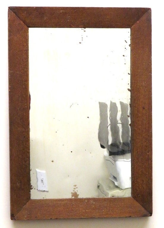 AN EARLY PRIMITIVE COUNTRY MIRROR