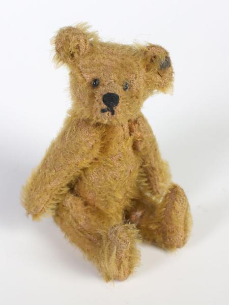 AN EARLY STEIFF MINIATURE TEDDY