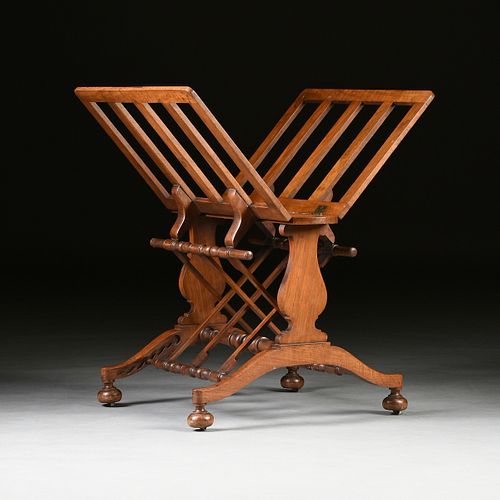 AN EARLY VICTORIAN CARVED WALNUT