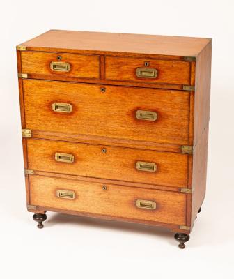 An early Victorian teak and brass
