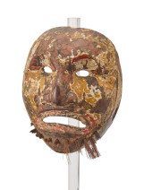 AN EAST ASIAN CARVED WOOD MASK