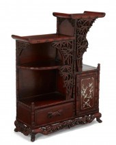 AN EAST ASIAN CARVED WOOD DISP