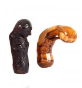 An ebonised kriss handle in th