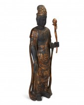 AN EBONIZED AND GILTWOOD STAND