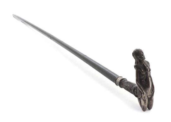 An Ebonized and Sterling Silver