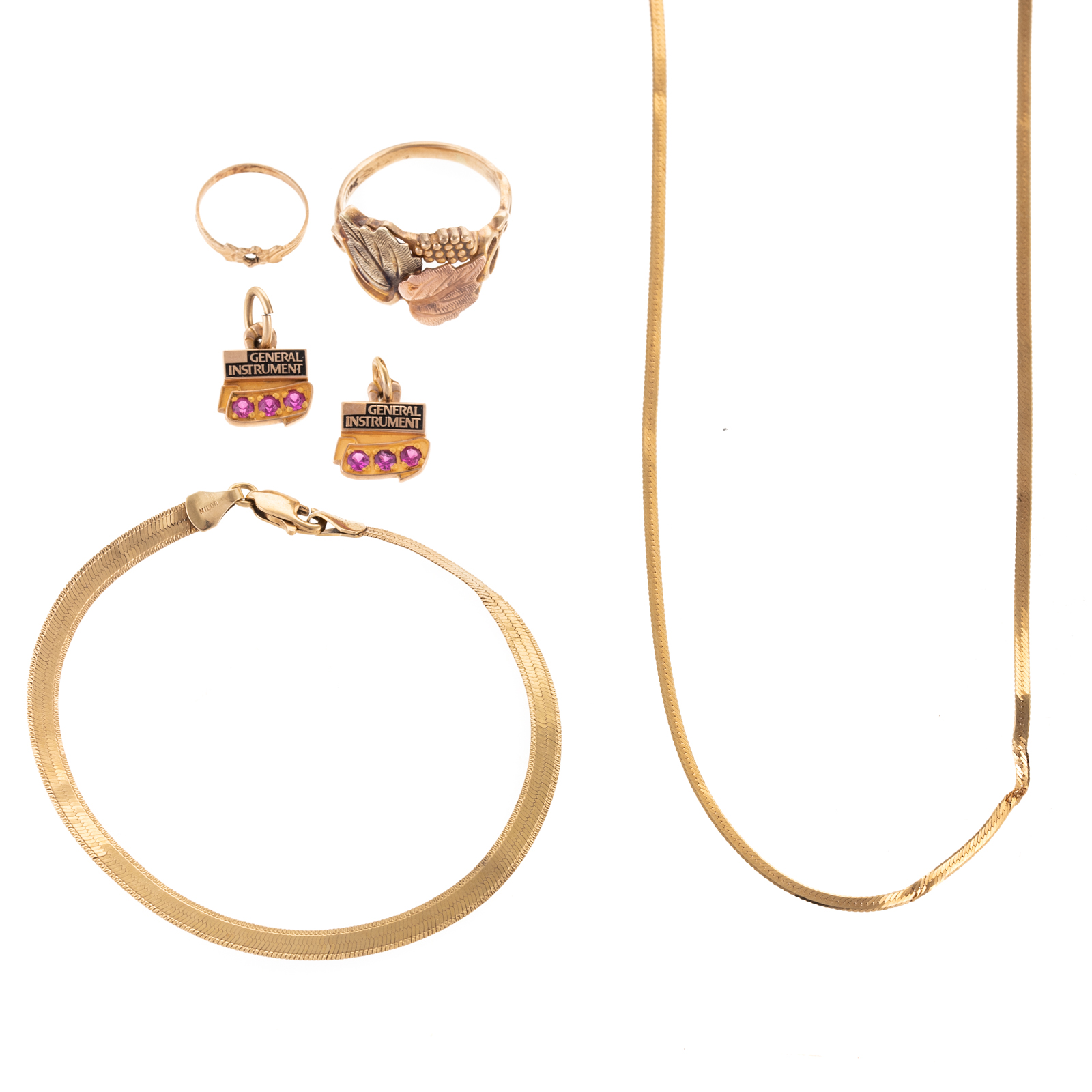 AN ECLECTIC COLLECTION OF 18K