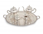AN EDDIE'S STERLING SILVER TEA