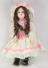 An Eden B?b? bisque head doll