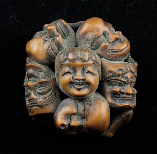 An Edo period hardwood manju