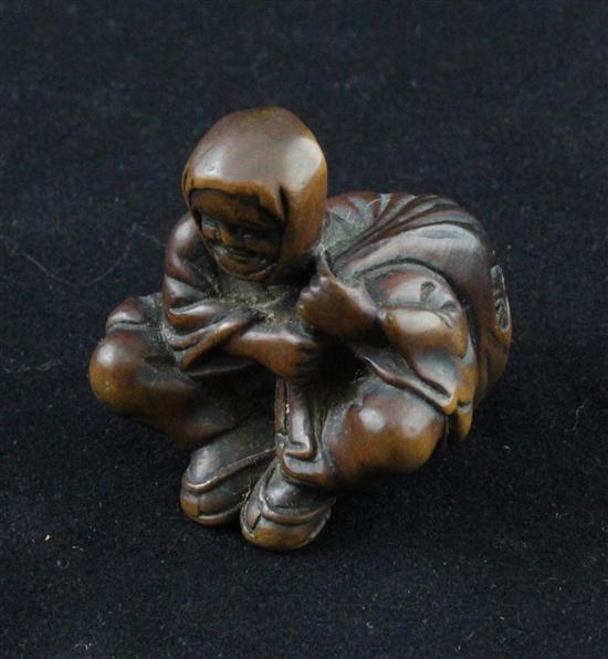 An Edo period hardwood netsuke