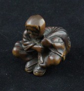 An Edo period hardwood netsuke
