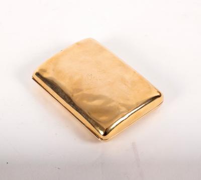 An Edwardian 9ct gold cigarette