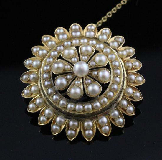 An Edwardian gold and split pearl