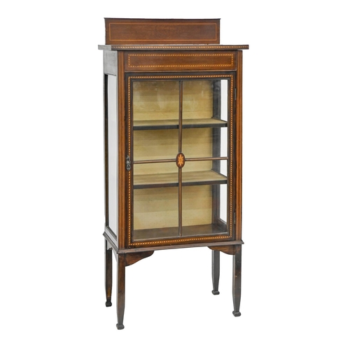 An Edwardian inlaid mahogany