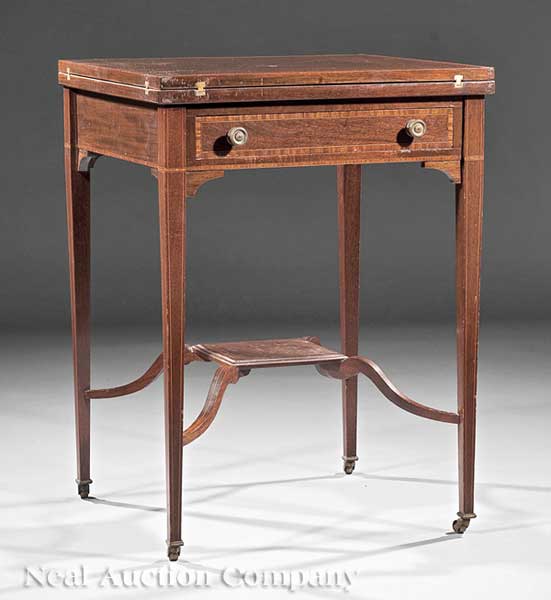 An Edwardian Inlaid Mahogany