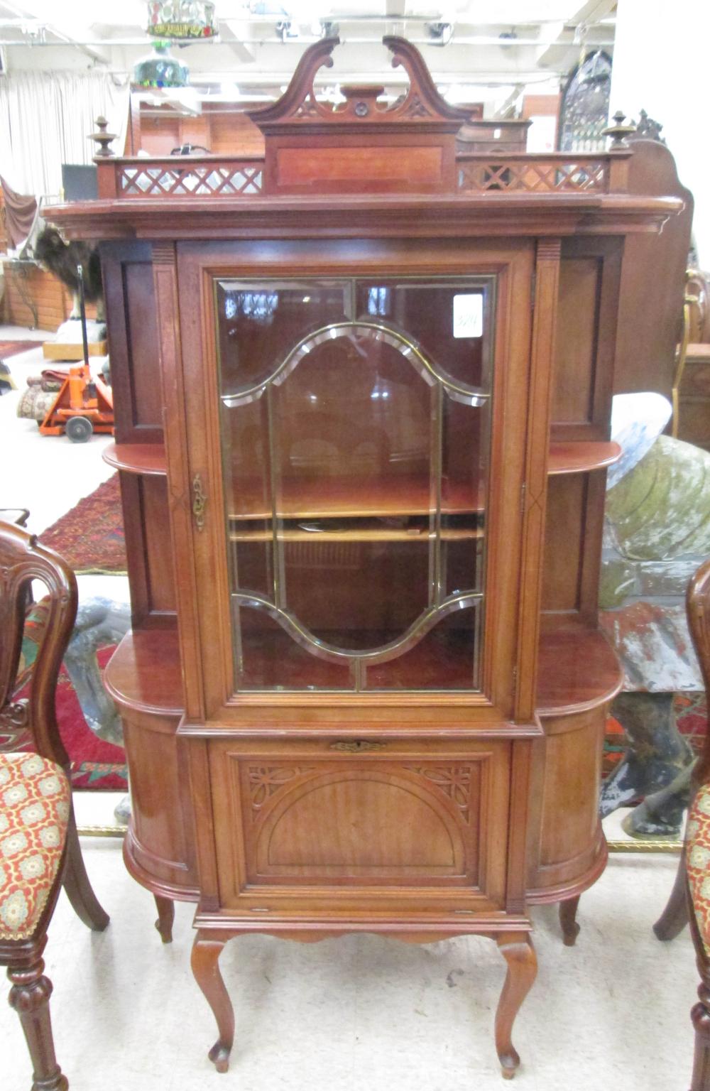 AN EDWARDIAN MAHOGAHY CHINA