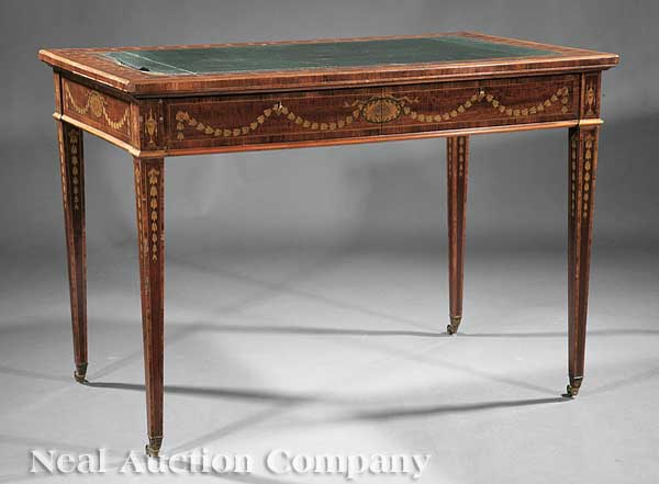 An Edwardian Mahogany and