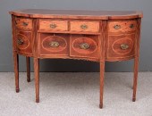 An Edwardian mahogany bow and