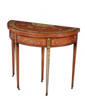 AN EDWARDIAN MAHOGANY DEMI-LUN