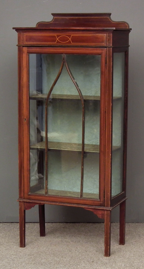 An Edwardian mahogany display