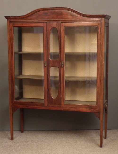 An Edwardian mahogany display