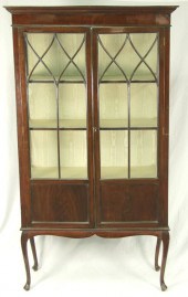 An Edwardian mahogany display