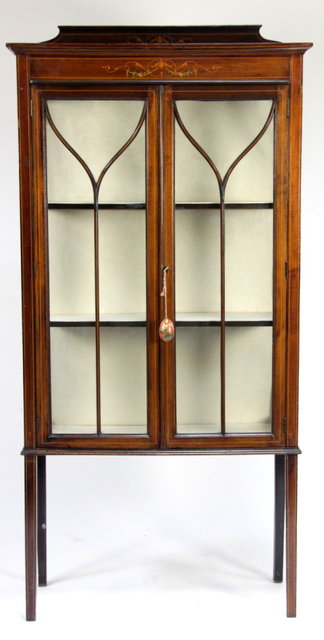 An Edwardian mahogany display