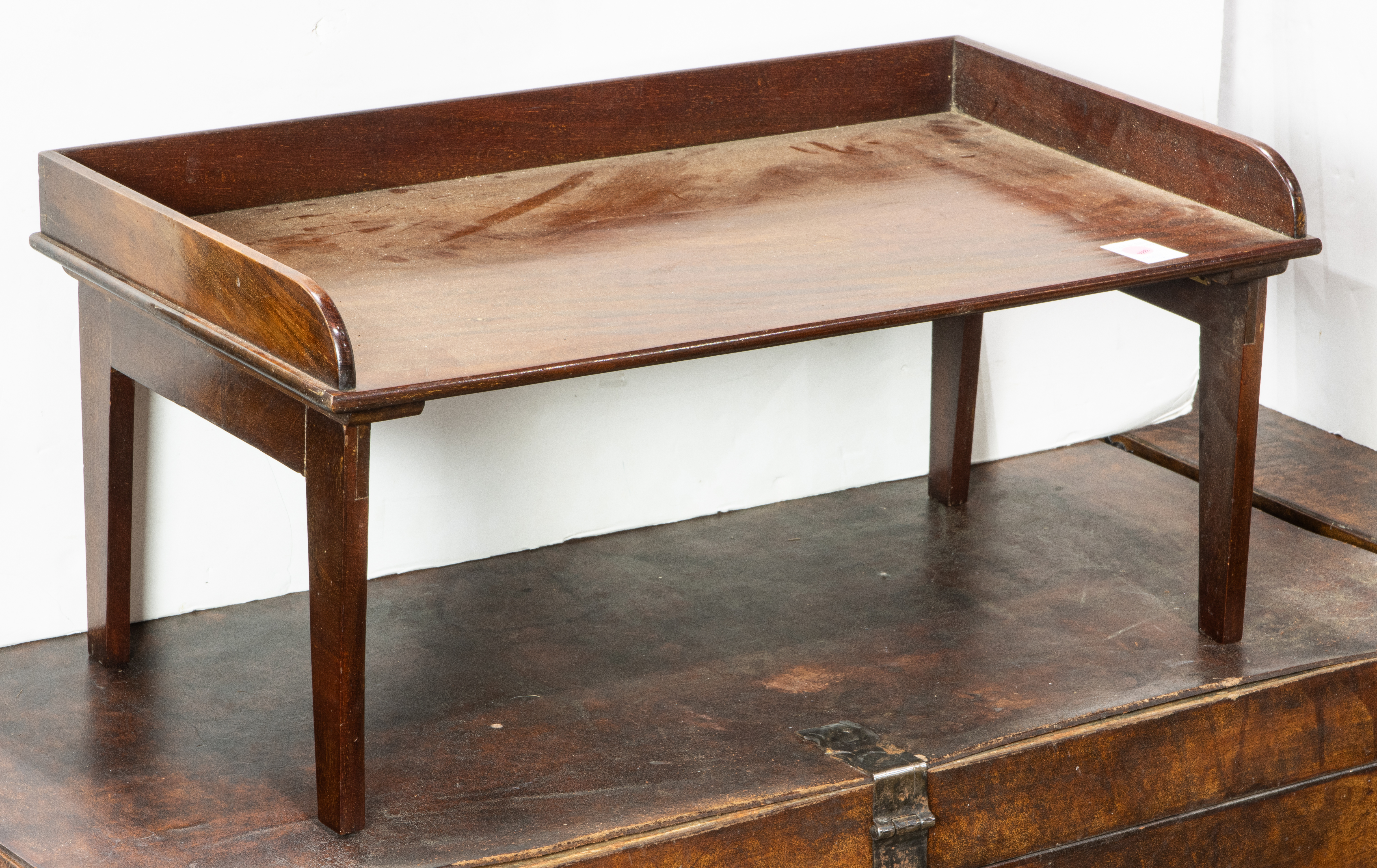 AN EDWARDIAN MAHOGANY FOLDING BED