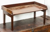 AN EDWARDIAN MAHOGANY FOLDING