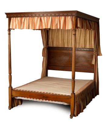 An Edwardian mahogany four-poster