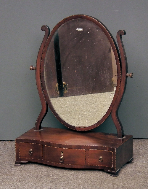 An Edwardian mahogany framed oval