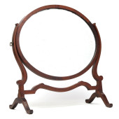 AN EDWARDIAN MAHOGANY OVAL DRE