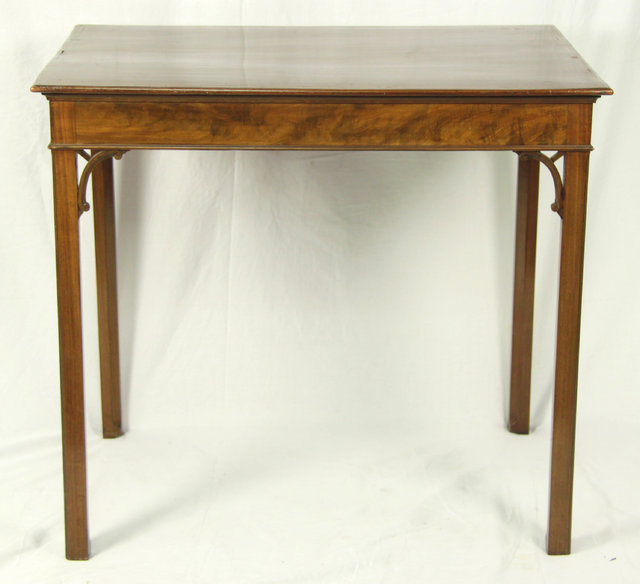An Edwardian mahogany side table
