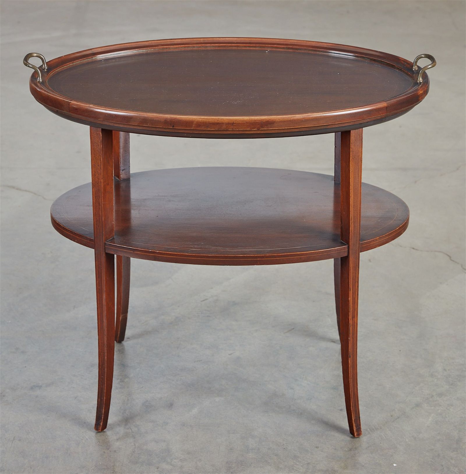 AN EDWARDIAN MAHOGANY TWO TIERED