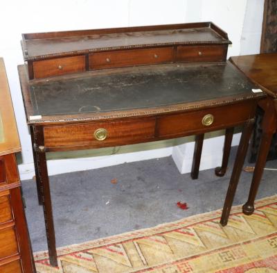 An Edwardian mahogany writing table