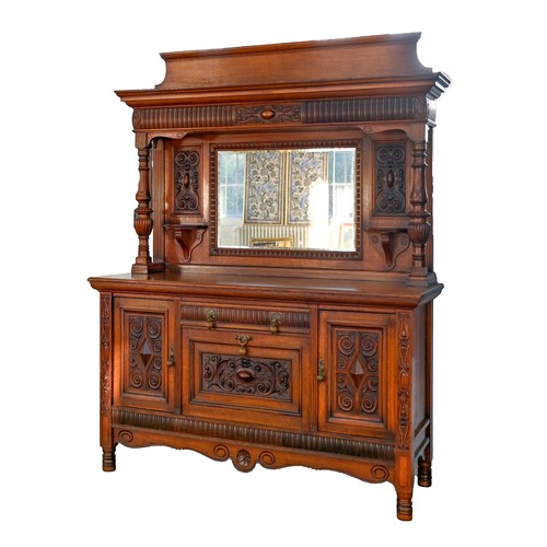 An Edwardian oak sideboard, with