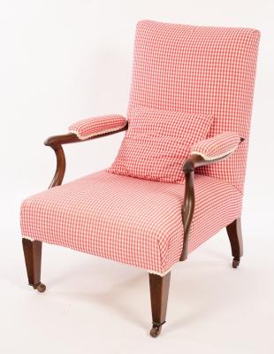 An Edwardian open armchair, the