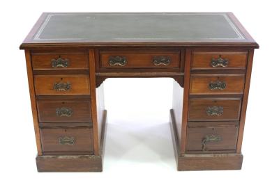 An Edwardian pedestal desk,