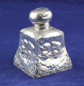 An Edwardian repousse silver m