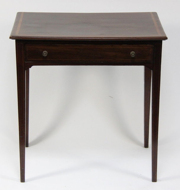 An Edwardian side table fitted a