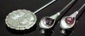 An Edwardian silver button top