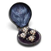 AN EDWARDIAN SILVER CASED SALT