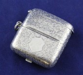 An Edwardian silver combinatio