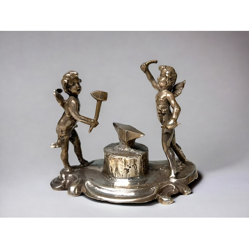 An Edwardian silver miniature